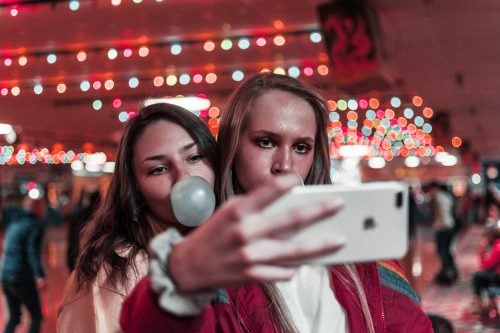ladies taking a selfie for TikTok