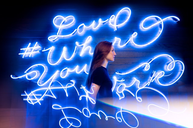 Woman with neon light - app promotion