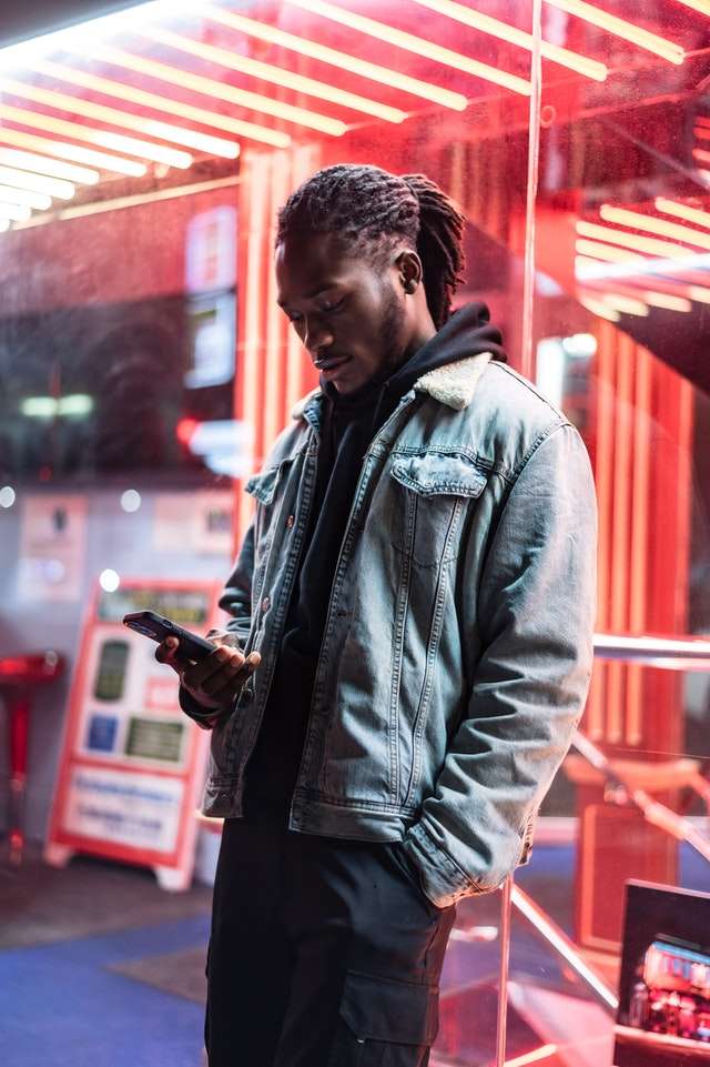 Black Man On Smart Phone